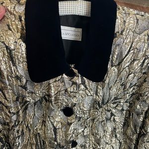 Velvet jacket with metallic gold decoration around bodice. Jacket is mid thigh